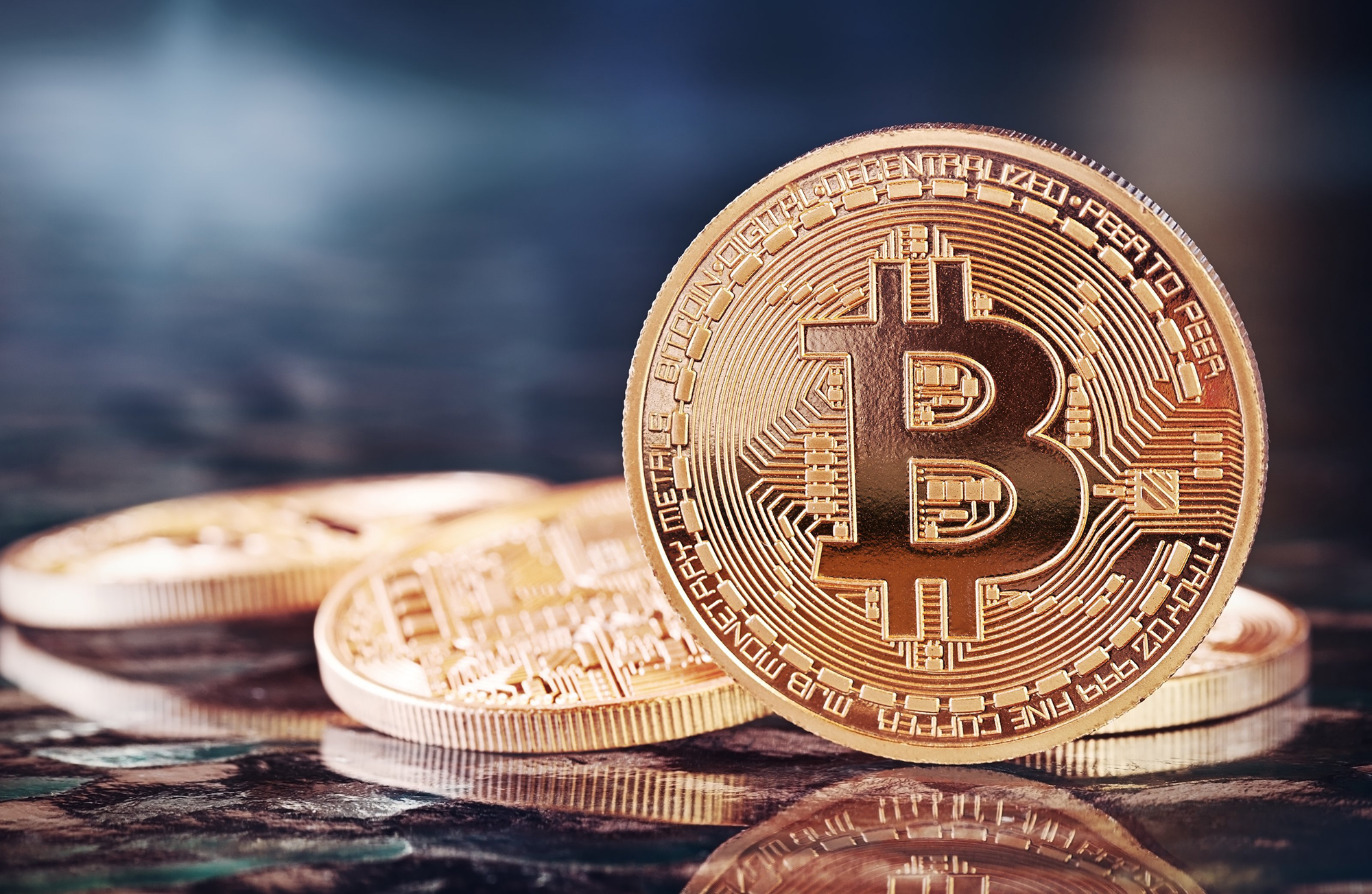 Курс биткоина упал ниже 7 тыс. долларов